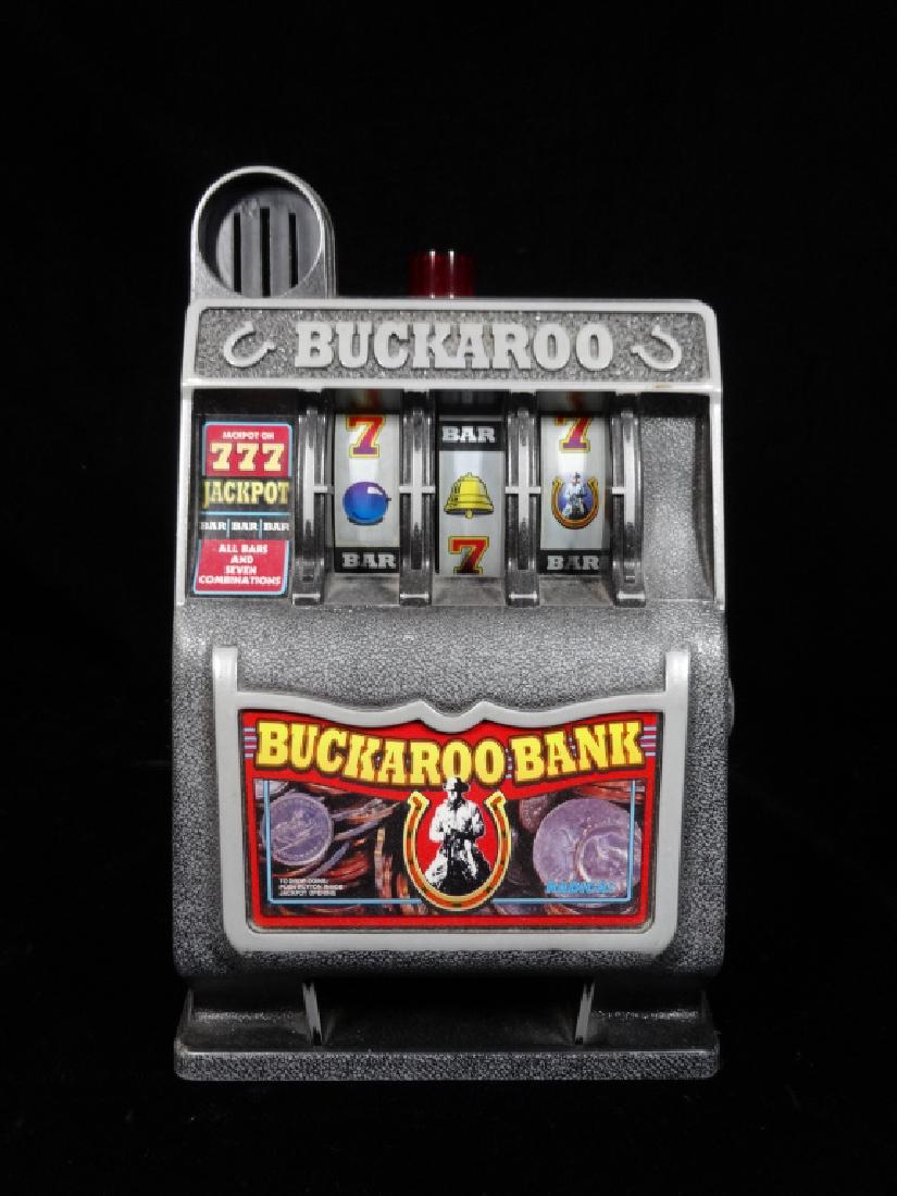 VINTAGE BUCKAROO BANK SLOT MACHINE, METAL AND PLASTIC, (1 of 6)