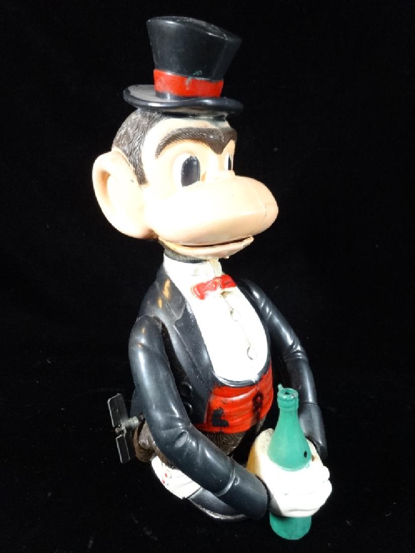 VINTAGE MECHANICAL MONKEY TOY WITH BOTTLE, WIND UP (1 of 4)