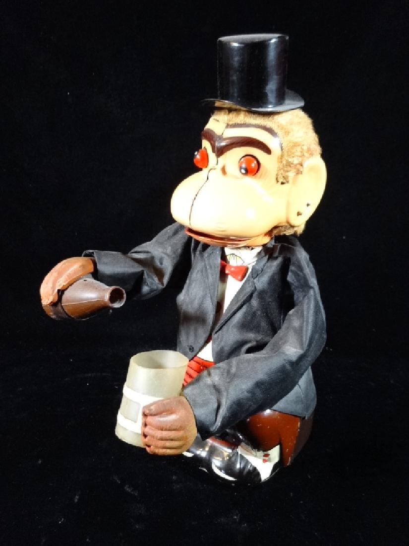 VINTAGE MECHANICAL DRINKING MONKEY TOY, WEARING TOP HAT (1 of 5)