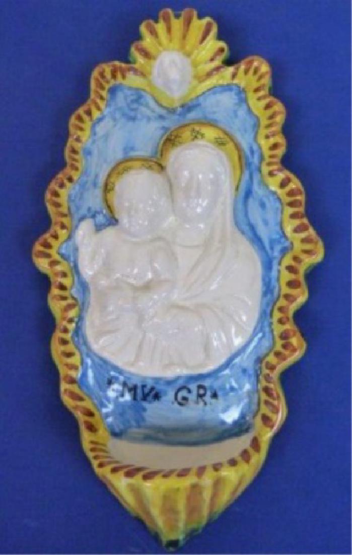 ITALIAN HOLY WATER FONT, CIRCA MID 1900S, HANDMADE AND: ITALIAN HOLY WATER FONT, CIRCA MID 1900S, HANDMADE AND HAND PAINTED, COVARRUBIAS STYLE BAS RELIEF ITALIAN FAIENCE MAJOLICA, BEARING THE EFFIGY OF THE VIRGIN MARY AND THE CHILD JESUS WITH TYPICAL COVAR