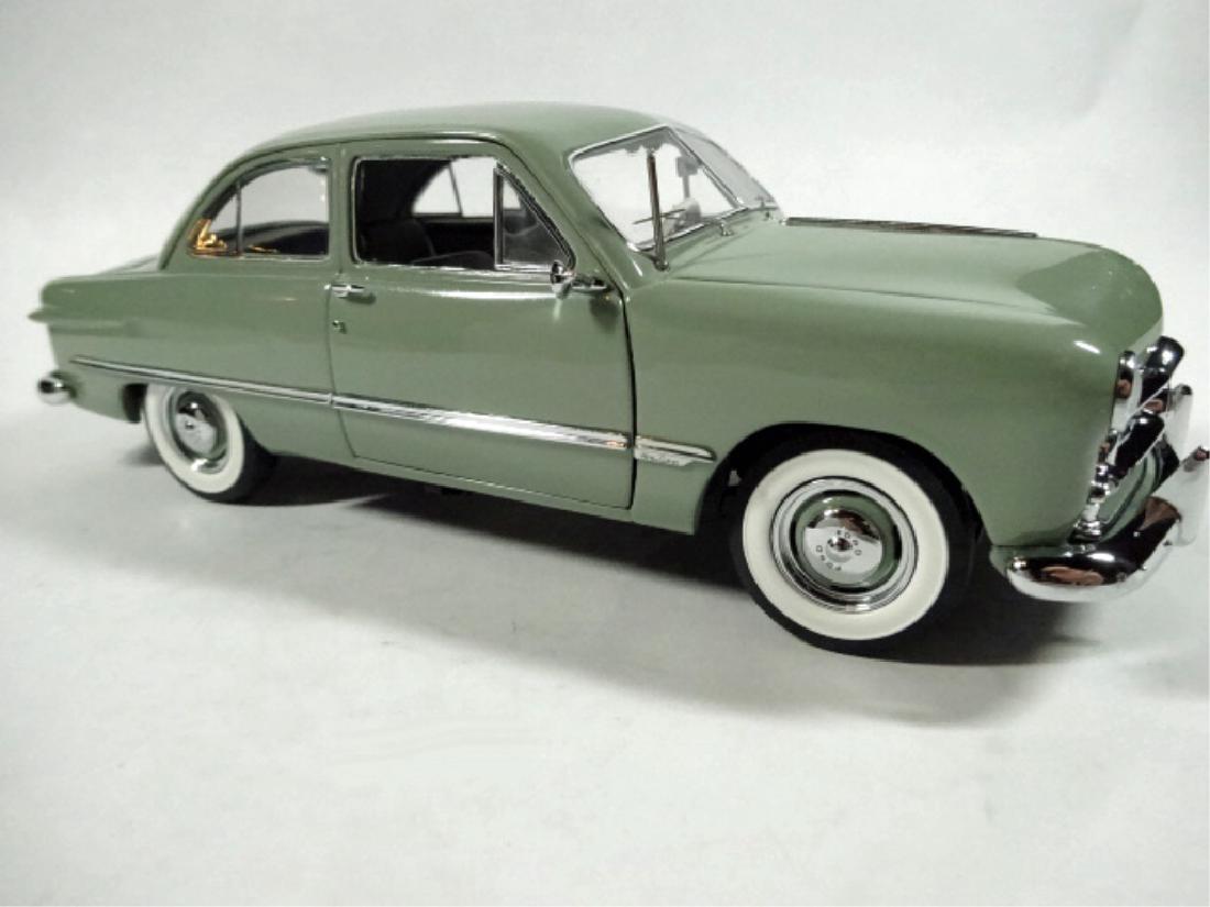 1949 FORD TUDOR, 1:24 DIECAST CAR BY DANBURY MINT, WITH: 1949 FORD TUDOR, 1:24 DIECAST CAR BY DANBURY MINT, WITH CERTIFICATE, VERY GOOD CONDITION, CAR MEASURES APPROX 8.5"; WITH BOX APPROX 12" X 6" X 5", SKU613-157