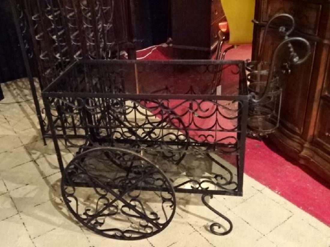 VINTAGE WROUGHT IRON BAR CART WITH WINE BOTTLE RACK,: VINTAGE WROUGHT IRON BAR CART WITH WINE BOTTLE RACK, GLASS SHELVES, VERY GOOD VINTAGE CONDITION WITH MINOR WEAR, 34" X 36" X 18", SKU622