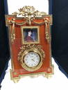 FABERGE CATHERINE THE GREAT CLOCK, BURNT ORANGE FRAME,