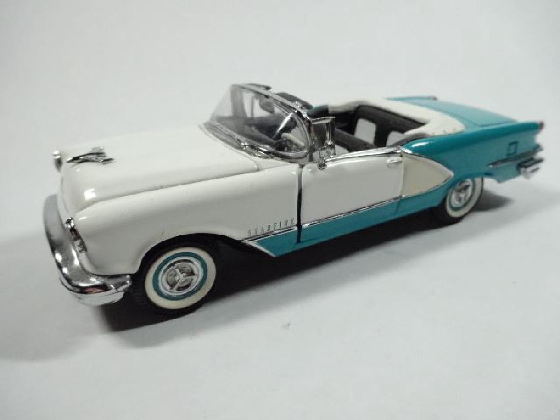 1956 OLDSMOBILE STARFIRE CONVERTIBLE, DIECAST CAR,: 1956 OLDSMOBILE STARFIRE CONVERTIBLE, DIECAST CAR, FRANKLIN MINT, SOLD AS PHOTOGRAPHED WITH BOX BUT NO PAPERWORK, VERY GOOD CONDITION, APPROX 5" SKU613 ITEM #231