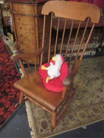 #1 OF TWO AVAILABLE MEDIUM FINISH ROCKING CHAIRS (SI: #1 OF TWO AVAILABLE MEDIUM FINISH ROCKING CHAIRS (SIMILAR DESIGNS, NOT EXACT MATCHES) EACH CHAIR SOLD SEPARATELY