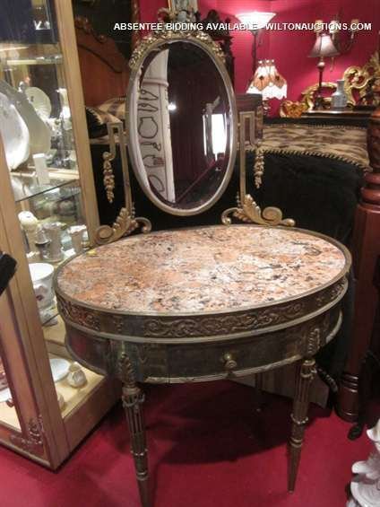 ANTIQUE LOUIS XVI STYLE BRONZE MARBLE TOP VANITY -: ANTIQUE LOUIS XVI STYLE BRONZE MARBLE TOP VANITY - LEGS, BASE, AND MIRROR ARE BRONZE. OVAL MARBLE TOP HAS A PRIOR REPAIR. APPROX 3.5'L X 4'H