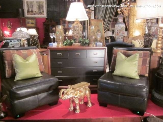 PAIR OF CHOCOLATE LEATHER SLIPPER CHAIRS WITH CONTE: PAIR OF CHOCOLATE LEATHER SLIPPER CHAIRS WITH CONTEMPORARY PRINT PILLOWS