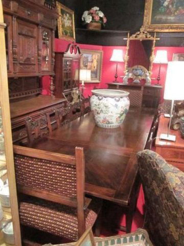 SPECTACULAR VINTAGE 1920's RENAISSANCE REVIVAL DIN: SPECTACULAR VINTAGE 1920's RENAISSANCE REVIVAL DINING TABLE WITH 10 CHAIRS, WITH 2 LEAVES THAT EXTEND FROM EACH END, 8 CHAIRS HAVE RED LEATHER SEATS, 2 ARE UPHOLSTERED ARMCHAIRS