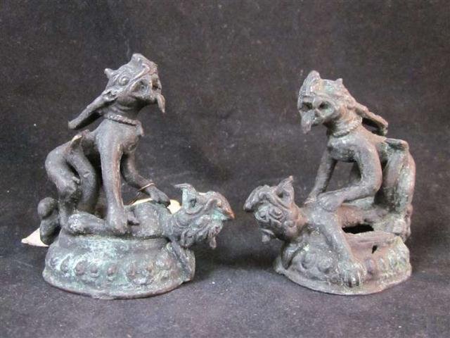 TWO METAL FIGURINES, MADE IN NEPAL, FIGHTING MYTHI: TWO METAL FIGURINES, MADE IN NEPAL, FIGHTING MYTHICAL CREATURES, APPROX 2 3/4" HIGH X 2 5/8" WIDE