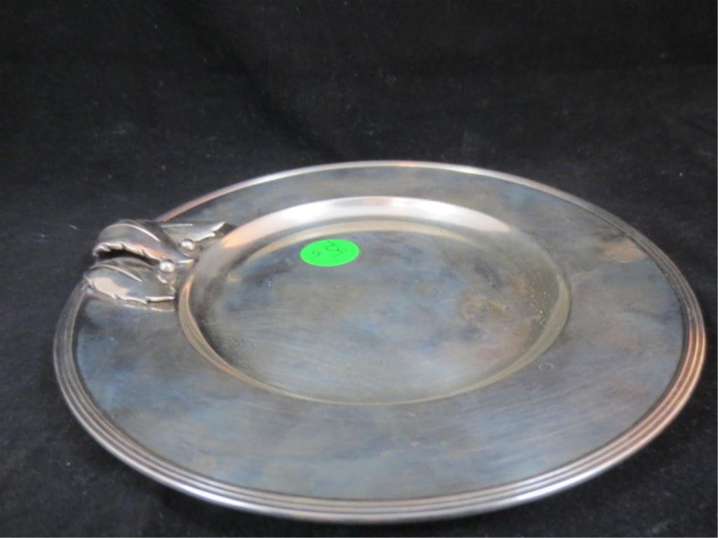 CARL POUL PETERSEN STERLING SILVER BOWL WITH LEAVE: CARL POUL PETERSEN STERLING SILVER BOWL WITH LEAVES, APPROX 6.25" DIAMETER, APPROX 129 GRAMS, MARKED PETERSEN STERLING 43103. MASTER CANADIAN SILVERSMITH PETERSEN TRAINED WITH GEORG JENSEN AND MARRIED