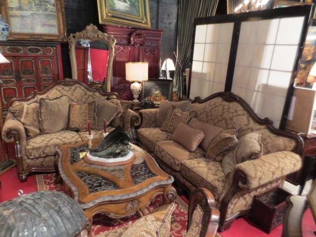OPULENT SOFA AND LOVESEAT, DARK WOOD FRAME, TAN AN: OPULENT SOFA AND LOVESEAT, DARK WOOD FRAME, TAN AND CREAM UPHOLSTERY WITH COORDINATING PLEATED AND FRINGED THROW PILLOWS, LIKE NEW CONDITION, (SECOND MATCHING LOVESEAT AND CHAIR SOLD SEPARATELY)
