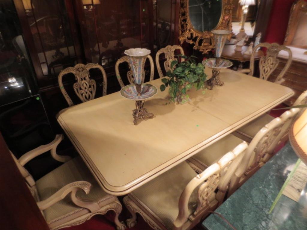 RICHLY CARVED CHIPPENDALE DINING TABLE, WHITE FINI: RICHLY CARVED CHIPPENDALE DINING TABLE, WHITE FINISH, DUAL PEDESTAL, BALL AND CLAW FEET, INCLUDES 2 LEAVES AND 8 CHAIRS (6 SIDE CHAIRS, TWO ARMCHAIRS), WITH OFF WHITE STRIPED UPHOLSTERY AND CLAW FEET