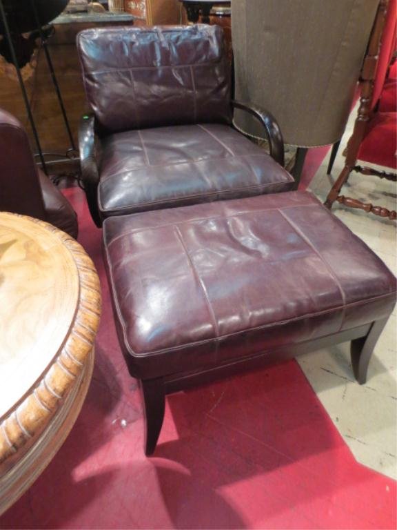 CONTEMPORARY LEATHER ARMCHAIR AND OTTOMAN, DESIGNER: CONTEMPORARY LEATHER ARMCHAIR AND OTTOMAN, DESIGNER ERIC BRAND FOR MULHOLLAND BROS., DARK BROWN LEATHER WITH ESPRESSO FINISH WOOD FRAME