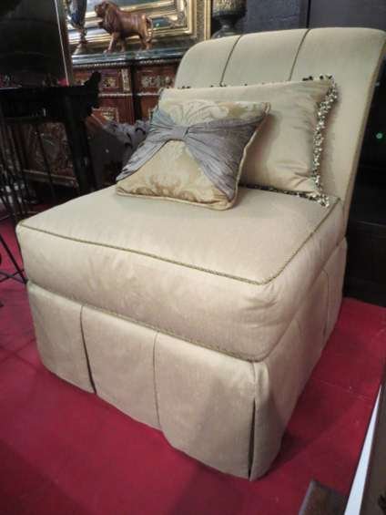 IMMACULATE DESIGNER JUDITH NORMAN SLIPPER CHAIR, P: IMMACULATE DESIGNER JUDITH NORMAN SLIPPER CHAIR, PALE GOLD UPHOLSTERY, DOWN FILLED CUSHIONS, SKIRTED BASE, BOLSTER PILLOW, LIKE NEW CONDITION, MATCHING SHELLBACK SOFA SOLD SEPARATELY