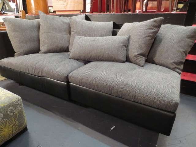 NATUZZI CONTEMPORARY SOFA/CHAISE, ANGLED BROWN LEAT: NATUZZI CONTEMPORARY SOFA/CHAISE, ANGLED BROWN LEATHER BASE, BEIGE UPHOLSTERED CUSHIONS, EXCELLENT CONDITION, LABELED NATUZZI