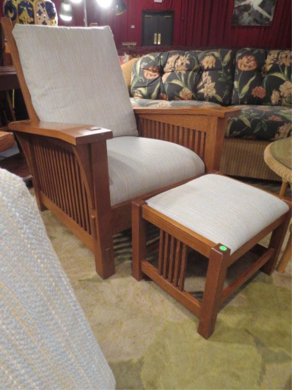 STICKLEY ARTS AND CRAFTS OAK RECLINING MORRIS CHAIR: STICKLEY ARTS AND CRAFTS OAK RECLINING MORRIS CHAIR AND OTTOMAN, PALE BLUE AND BEIGE UPHOLSTERY, BOTH PIECES LABELED STICKLEY, IMMACULATE CONDITION, MATCHING SOFA SOLD SEPARATELY