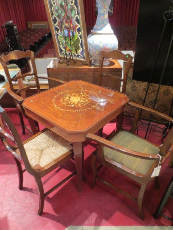 ITALIAN MARQUETRY GAME TABLE WITH OPTIONAL CHESS A: ITALIAN MARQUETRY GAME TABLE WITH OPTIONAL CHESS AND BACKGAMMON TOPS, SLIDES OUT TO REVEAL ROULETTE WHEEL AND PLAYING SURFACE, WHEN CLOSED TOP HAS A FLORAL INLAID TOP, APPROX 4' SQUARE, CHAIRS IN PHOT