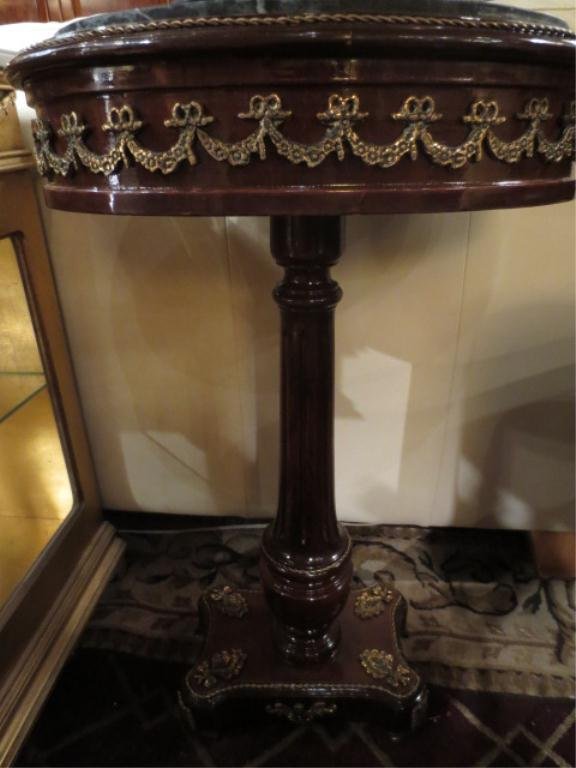 FRENCH EMPIRE STYLE PEDESTAL SIDE TABLE, OVAL TOP : FRENCH EMPIRE STYLE PEDESTAL SIDE TABLE, OVAL TOP WITH BEVELED BLACK MARBLE, GILT BRONZE ORMOLU ON APRON AND BASE, MAHOGANY FINISH, APPROX 18" L