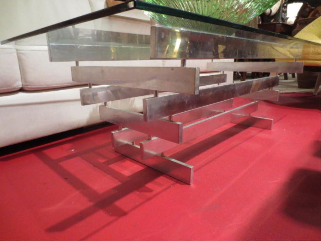 MIDCENTURY MODERN ALUMINUM COFFEE TABLE, CIRCA 1965, AT: MIDCENTURY MODERN ALUMINUM COFFEE TABLE, CIRCA 1965, ATTRIBUTED TO DESIGNER PAUL MAYEN FOR HABITAT, STACKED ALUMINUM BARS WITH GLASS TOP, VERY GOOD CONDITION, SOME MINOR SCRATCHES TO ALUMINUM, BASE IS