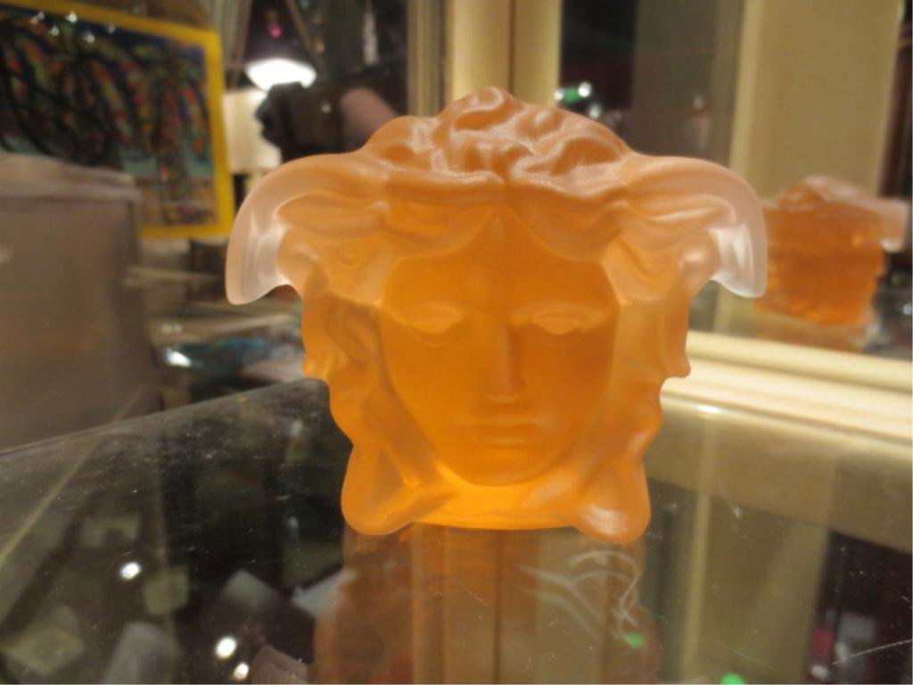 ROSENTHAL VERSACE MEDUSA PAPERWEIGHT, ORANGE, DESIGNED : ROSENTHAL VERSACE MEDUSA PAPERWEIGHT, ORANGE, DESIGNED BY GIANNI VERSACE FOR ROSENTHAL CHINA, ETCHED ROSENTHAL VERSACE, APPROX 3" X 4" ** PLEASE NOTE: ARRANGEMENTS FOR SHIPPING AND PACKAGING ARE THE S