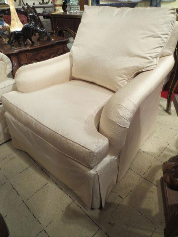 BAKER FURNITURE SILK ARMCHAIR, PALE CREAM TONE ON TONE : BAKER FURNITURE SILK ARMCHAIR, PALE CREAM TONE ON TONE STRIPED SILK UPHOLSTERY, DOWN CUSHIONS, SKIRTED BASE, LABELED BAKER FURNITURE ** PLEASE NOTE: ARRANGEMENTS FOR SHIPPING AND PACKAGING ARE THE SOL