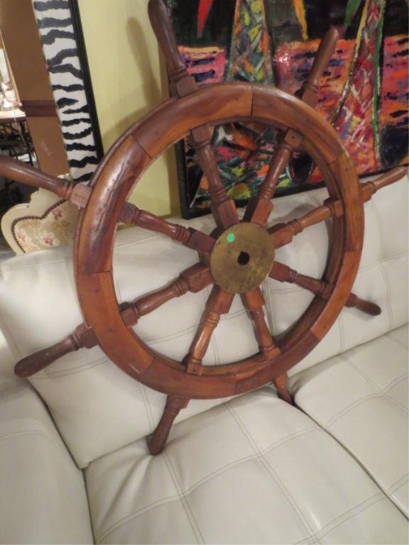 WOODEN SHIP'S WHEEL, WITH BRASS CENTER, APPROX 35"ROUND: WOODEN SHIP'S WHEEL, WITH BRASS CENTER, APPROX 35"ROUND "** PLEASE NOTE: ARRANGEMENTS FOR SHIPPING AND PACKAGING ARE THE SOLE RESPONSIBILITY OF THE WINNING BIDDER. THE AUCTION HOUSE DOES NOT PROVIDE S