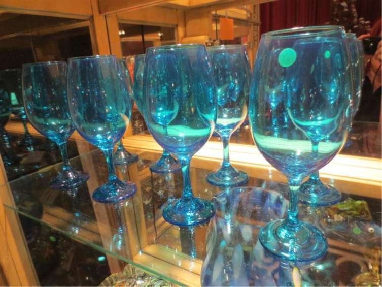 8 BLUE WINE GLASSES, APPROX 8.5"H: 8 BLUE WINE GLASSES, APPROX 8.5"H ~~~ PLEASE NOTE: ARRANGEMENTS FOR SHIPPING AND PACKAGING ARE THE SOLE RESPONSIBILITY OF THE WINNING BIDDER. THE AUCTION HOUSE DOES NOT PROVIDE PACKING/CRATING SERVICE