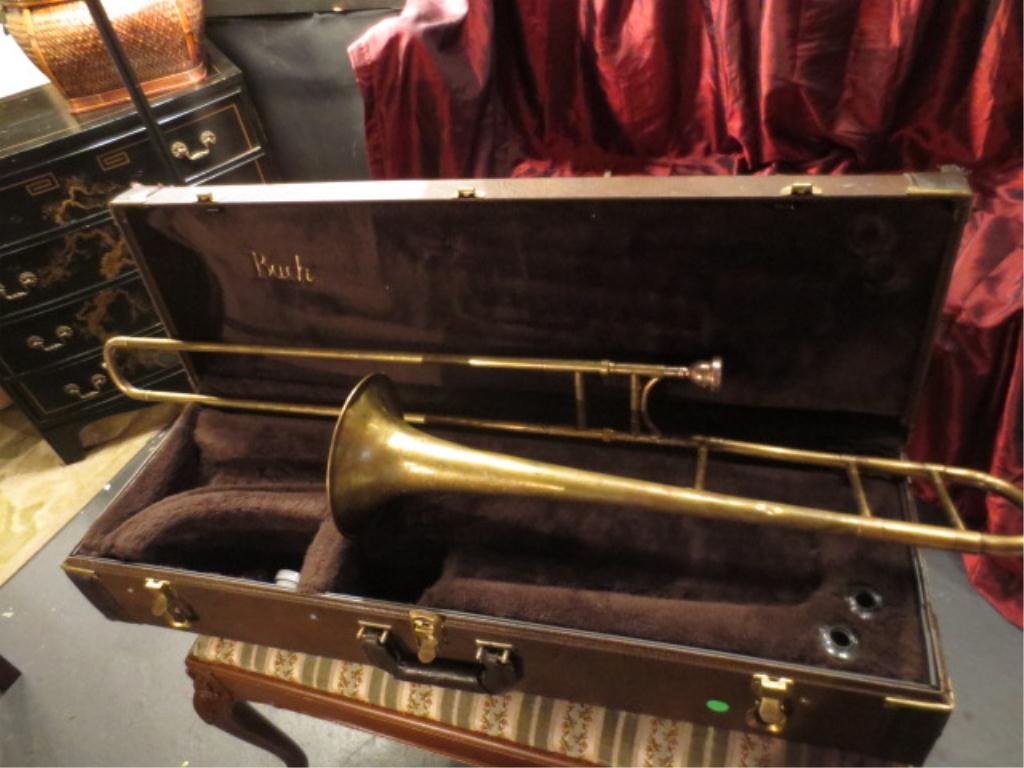 H. N. WHITE TROMBONE, MADE IN CLEVELAND, OHIO, WITH VIN: H. N. WHITE TROMBONE, MADE IN CLEVELAND, OHIO, WITH VINCENT BACH CASE & MOUTHPIECE; VINTAGE PIECE WITH CORRESPONDING DENTS