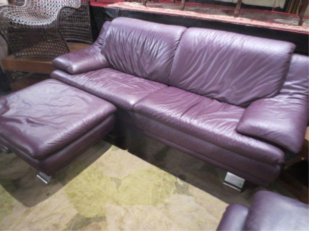2 PC SET NATUZZI "GALAXIAN" CONTEMPORARY LEATHER SOFA A: 2 PC SET NATUZZI "GALAXIAN" CONTEMPORARY LEATHER SOFA AND OTTOMAN, MODEL 1671, DEEP AUBERGINE LEATHER WITH CURVED CHROME FEET, EXCELLENT CONDITION, MATCHING SECOND SOFA WITH CHAIR AND OTTOMAN SOLD SEP