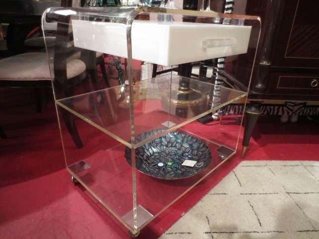 LUCITE BAR CART ON CASTERS, CLEAR AND WHITE LUCITE, SIN: LUCITE BAR CART ON CASTERS, CLEAR AND WHITE LUCITE, SINGLE DRAWER WITH CLEAR LUCITE HANDLE, 2 SHELVES, APPROX 3.5'L