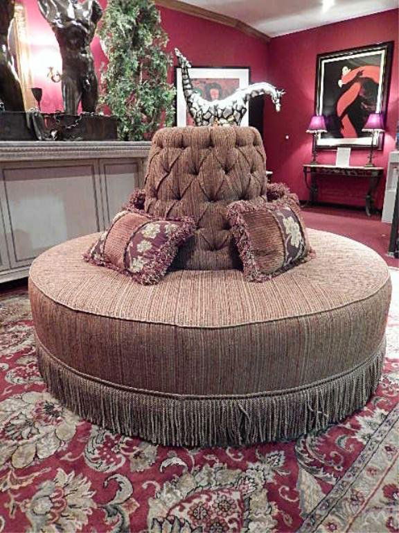 Circular Confidante Sofa Tufted Back Fringed Base