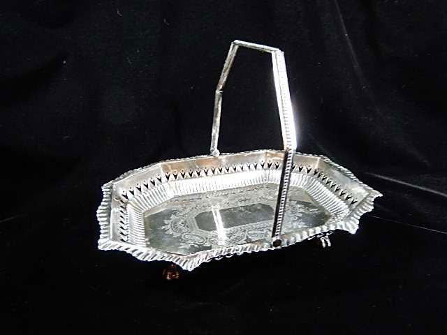 K & P SILVERPLATE BASKET, APPROX 11"L X 8"W X 2"H,: K & P SILVERPLATE BASKET, APPROX 11"L X 8"W X 2"H, APPROX 8"H WITH HANDLE UP