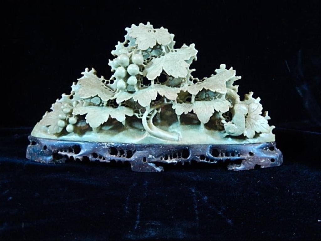 VINTAGE CHINESE CARVED SOAPSTONE MOUNTAIN WITH: VINTAGE CHINESE CARVED SOAPSTONE MOUNTAIN WITH GRAPEVINES, APPROX 8"L