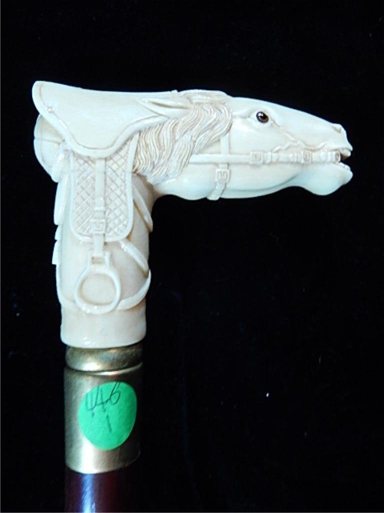 CARVED BONE HANDLE CANE/WALKING STICK, HORSE HEAD: CARVED BONE HANDLE CANE/WALKING STICK, HORSE HEAD HANDLE MEASURES APPROX 4.5"