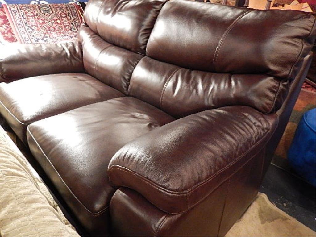 BROWN LEATHER LOVESEAT, NEW, USED ONLY FOR STAGING,: BROWN LEATHER LOVESEAT, NEW, USED ONLY FOR STAGING, EXCELLENT CONDITION