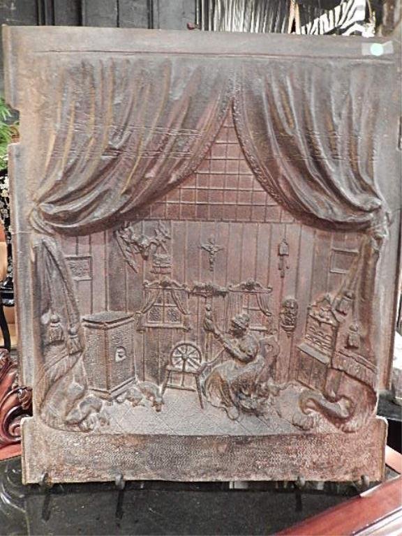 ANTIQUE CAST IRON FIREPLACE BACK PLATE, INTERIOR SCENE