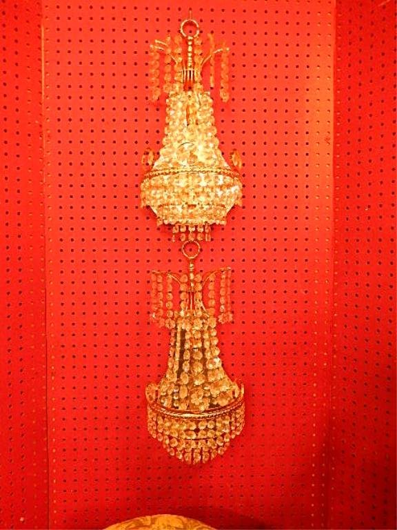 PAIR CRYSTAL AND BRASS ELECTRIC WALL LIGHTS,: PAIR CRYSTAL AND BRASS ELECTRIC WALL LIGHTS, CRYSTAL SWAGS AND DROPS OVER BRASS BASE, MIRRORED BACKS, APPROX 18"H