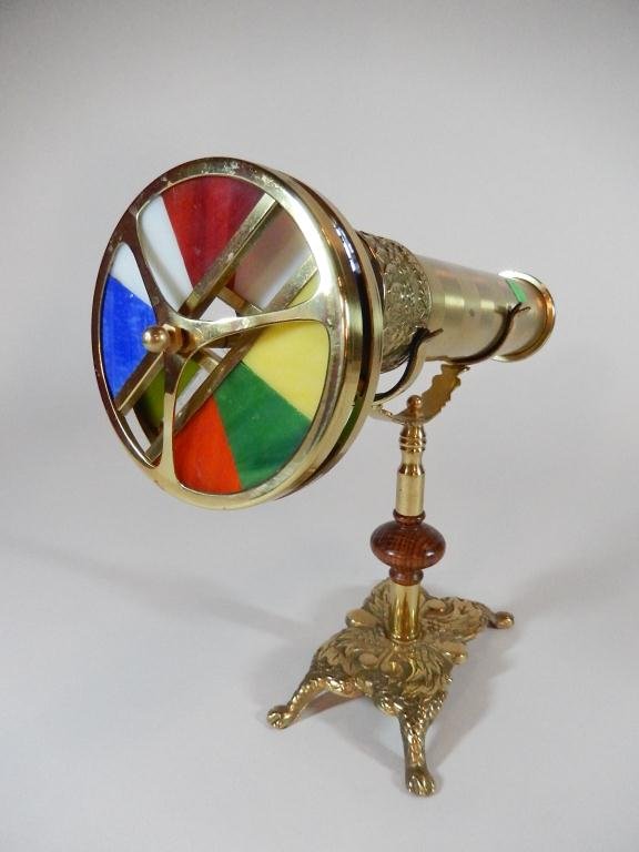 DOUBLE WHEEL KALEIDOSCOPE WITH STAND, APPROX 12"L X: DOUBLE WHEEL KALEIDOSCOPE WITH STAND, APPROX 12"L X 10"H ON STAND