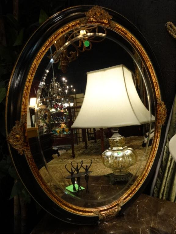 GOLD AND BLACK OVAL MIRROR, APPROX 32"H: GOLD AND BLACK OVAL MIRROR, APPROX 32"H