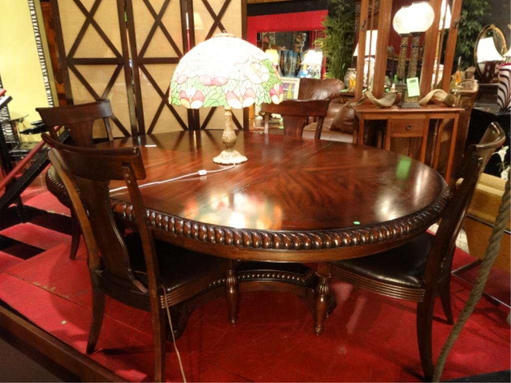 WOOD DINING TABLE WITH 4 LEATHER SEAT CHAIRS, APPROX: WOOD DINING TABLE WITH 4 LEATHER SEAT CHAIRS, APPROX 62" ROUND WITH 20" LEAF, GOOD CONDITION, SOME NICKS AND SURFACE SCRATCHES