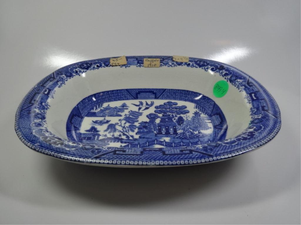 ANTIQUE BUFFALO POTTERY BOWL, DATED 1910, SEMI-VITREOUS: ANTIQUE BUFFALO POTTERY BOWL, DATED 1910, SEMI-VITREOUS BLUE & WHITE ORIENTALIST DESIGN, APPROX 7" X 8.5" (SKU#899.04)