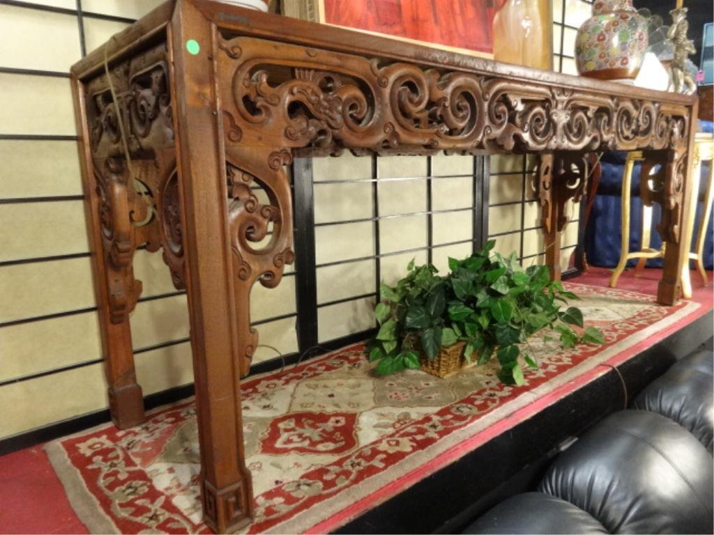 ANTIQUE CHINESE HARDWOOD ALTAR TABLE, ELABORATELY: ANTIQUE CHINESE HARDWOOD ALTAR TABLE, ELABORATELY CARVED APRON, EXCELLENT CONDITION, APPROX 7'W X 24"D X 33.75"H, PROVENANCE: FROM THE ESTATE OF ART & ASIAN ANTIQUITIES GALLERY OWNER DOROTHY P. LEVESS