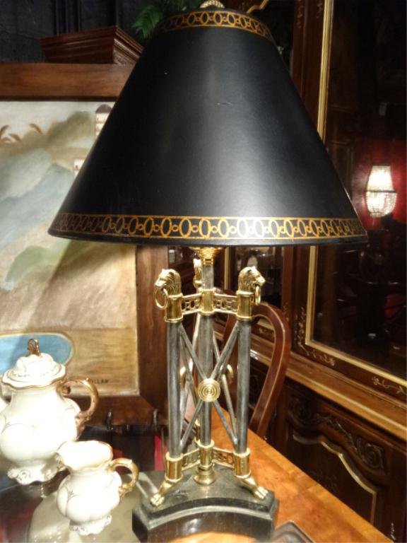 MAITLAND SMITH NEOCLASSIC GILT METAL LAMP, LIONS HEADS: MAITLAND SMITH NEOCLASSIC GILT METAL LAMP, LIONS HEADS AND PAW FEET, ON MARBLE BASE, BLACK AND GOLD SHADE, LABELED MAITLAND SMITH, APPROX 30"H