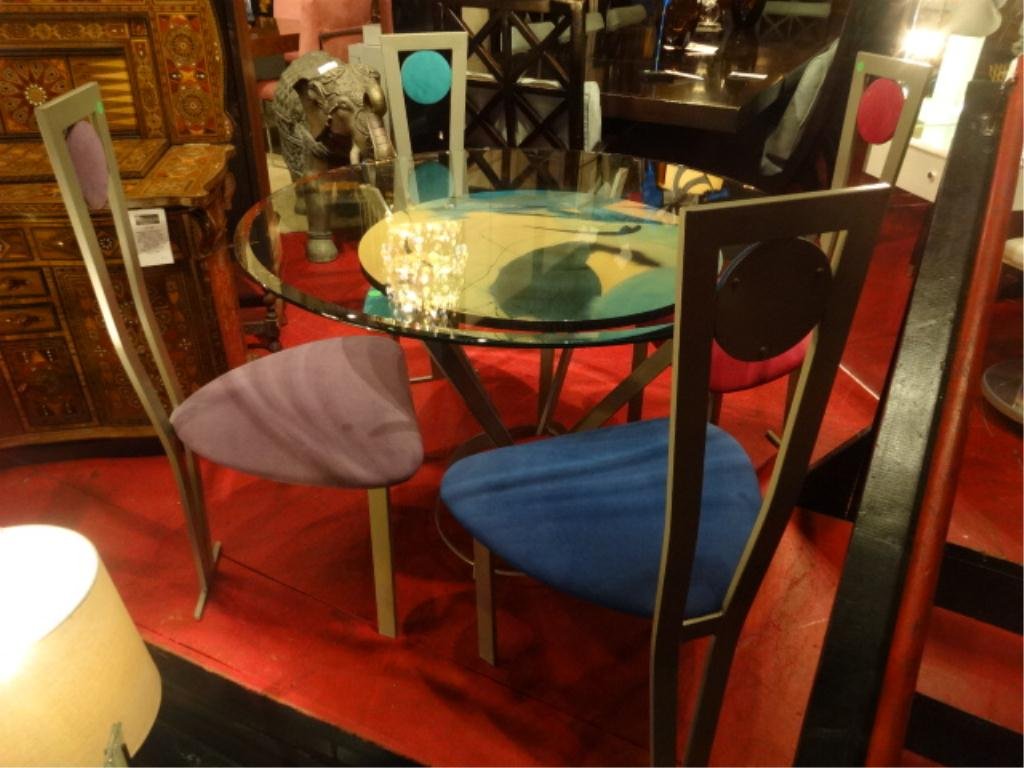 MODERN DINING TABLE WITH 4 MULTICOLOR CHAIRS, PAINTED: MODERN DINING TABLE WITH 4 MULTICOLOR CHAIRS, PAINTED TABLE TOP UNDER GLASS, BLUE, PURPLE, TURQUOISE, AND PINK UPHOLSTERED SEATS, GRAY METAL BASE, APPROX 38" ROUND GLASS TOP