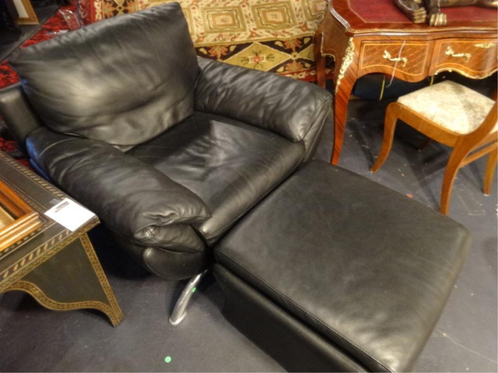 NATUZZI BLACK LEATHER LOUNGE CHAIR AND OTTOMAN, MODERN: NATUZZI BLACK LEATHER LOUNGE CHAIR AND OTTOMAN, MODERN DESIGN, CURVED CHROME FEET