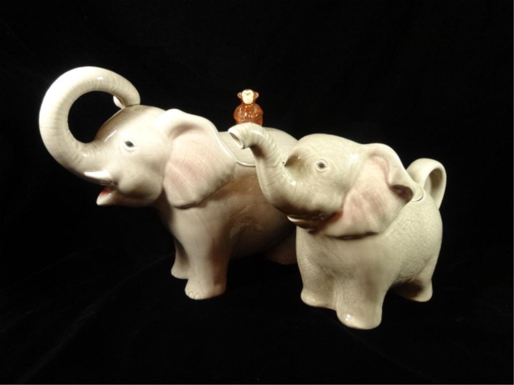 2 CERAMIC ELEPHANT COOKIE JARS / CONTAINERS, APPROX: 2 CERAMIC ELEPHANT COOKIE JARS / CONTAINERS, APPROX 9.5" X 12.5" AND 7.75" X 11.5", SKU291.08