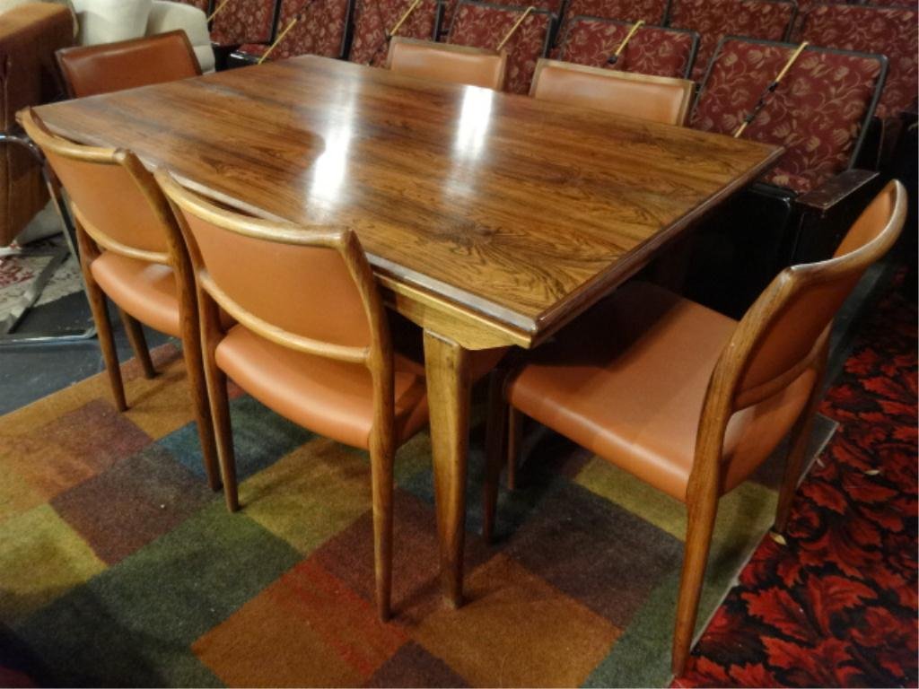 SIX J. L. MOLLER MID CENTURY DINING CHAIRS, CIRCA: SIX J. L. MOLLER MID CENTURY DINING CHAIRS, CIRCA 1950'S, WITH DANISH MODERN DRAW LEAF DINING TABLE, OVERALL CONDITION VERY GOOD, TABLE TOP APPEARS TO HAVE BEEN REFINISHED OR SLIGHTLY FADED BUT DRAW L