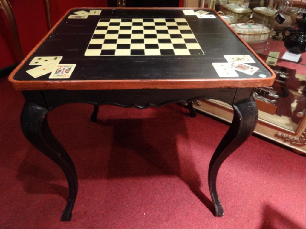 NEIMAN MARCUS GAME TABLE, BLACK PAINTED FINISH WITH: NEIMAN MARCUS GAME TABLE, BLACK PAINTED FINISH WITH PLAYING CARD DESIGNS, CABRIOLE LEGS, GAME PIECE STORAGE UNDER TABLE TOP, APPROX 40" X 40"