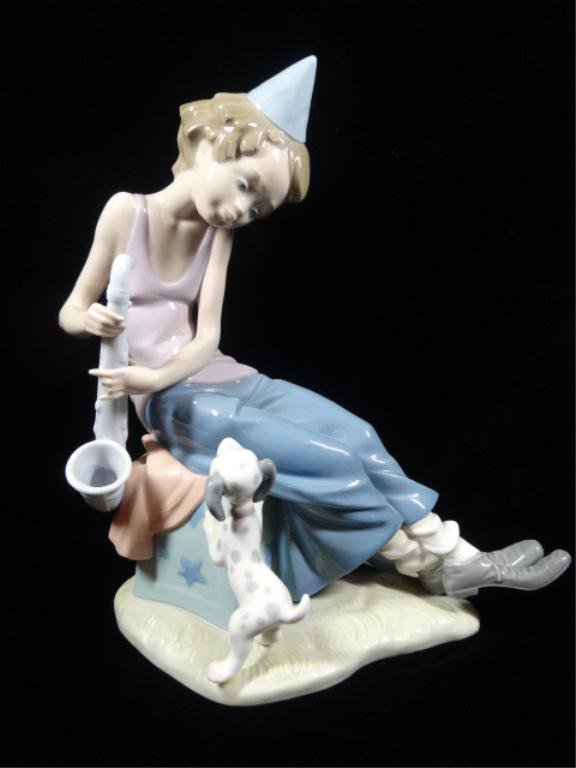 LLADRO PORCELAIN FIGURINE, GIRL WITH SAXOPHONE & DOG,: LLADRO PORCELAIN FIGURINE, GIRL WITH SAXOPHONE & DOG, APPROX 10.25"H, SKU344.08
