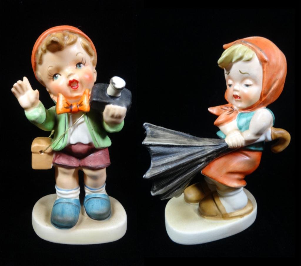 2 FIGURINES, HUMMEL STYLE, "THE PHOTOGRAPHER" &: 2 FIGURINES, HUMMEL STYLE, "THE PHOTOGRAPHER" & "UMBRELLA GIRL", TITLES & CROSSED ARROW MARKS ON BOTTOM, APPROX 5.5"H & 5"H, SKU349